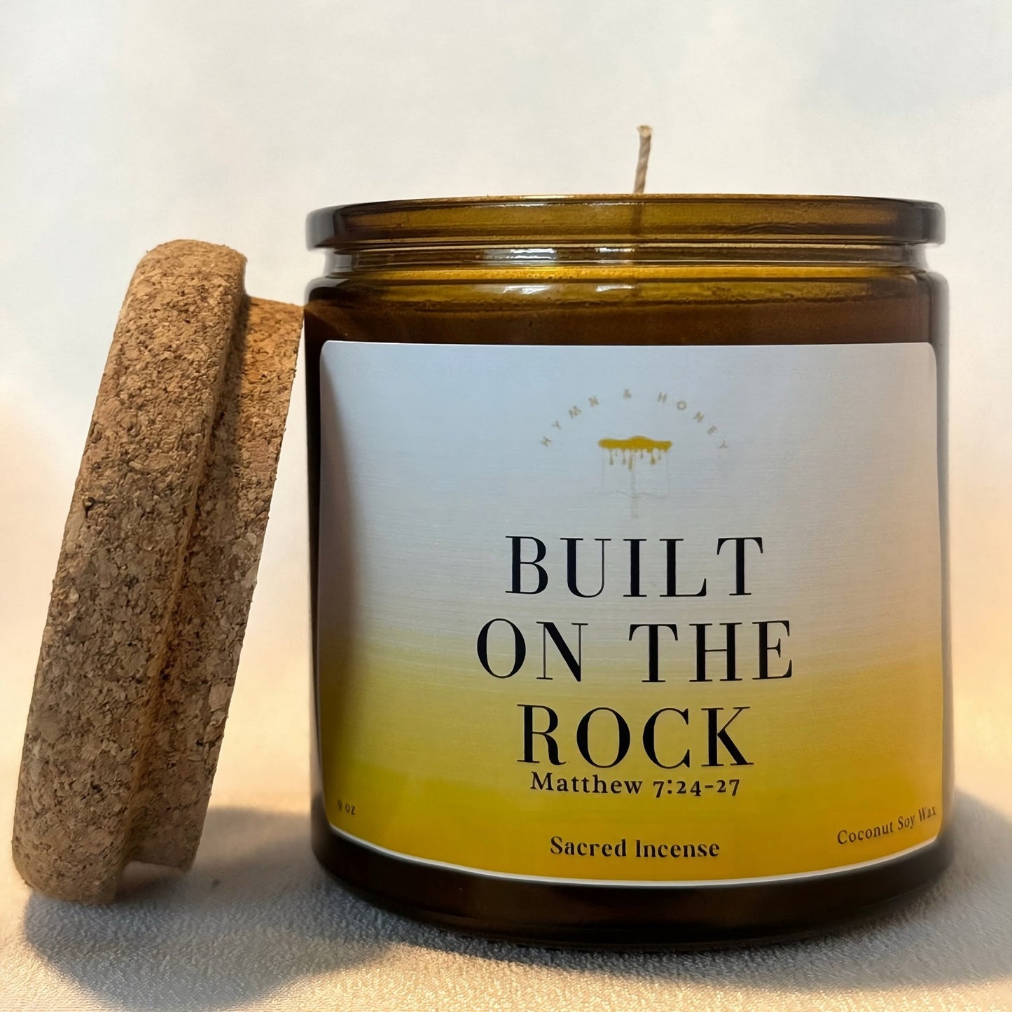 Handcrafted Built on the Rock Christian candle, designed to create a peaceful prayer space.