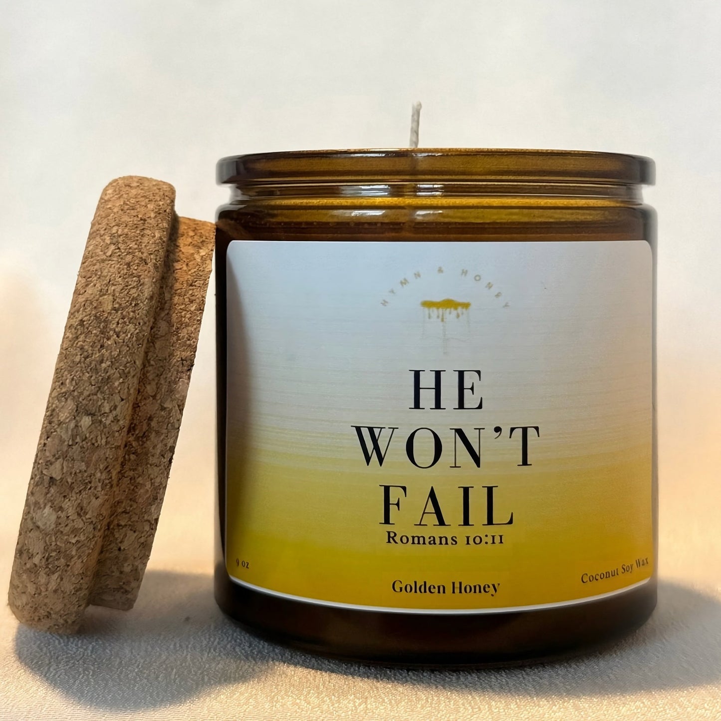 Handcrafted He Won’t Fail Christian prayer candle for worship and meditation.